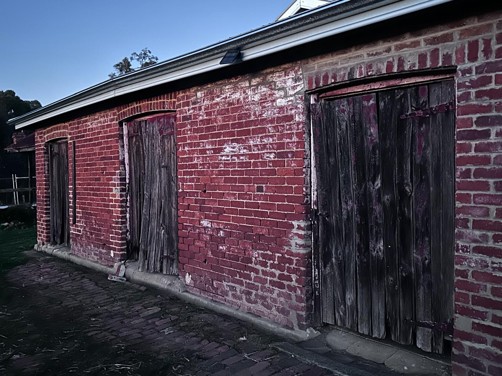 The dairy shed's original doors at Guildford Farm